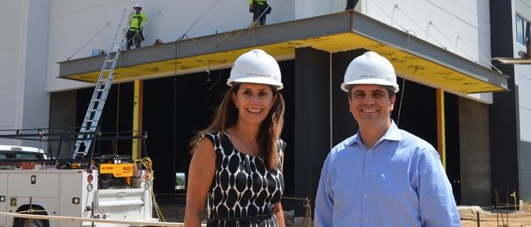 Ora Reynolds and Mike Bell in front of HMBC Logisitcs I