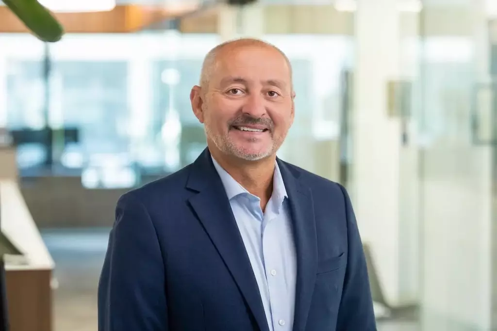 Director of Finance & Administration Clayton Holder is responsible for financial management, human resources, corporate benefits administration and public/private financing for Hunt Midwest.